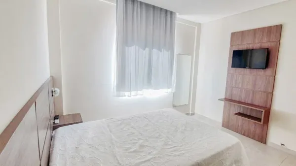 Sacada com churrasqueira dos Apartamentos 103 e 203