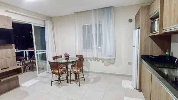 Sacada dos Apartamentos 104 e 204 com churrasqueira